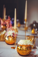 restaurant table setout with white plates and silverware