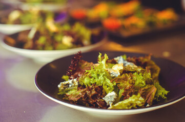 Healthy food. Fresh salad with quinoa and paprika on a plate. restaurant serving. Background image, copy space