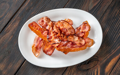Fried bacon on the serving plate