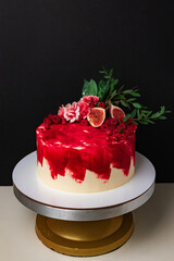 cake with berries, fruits and flowers