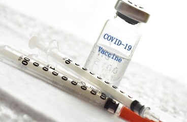 medicine in a vial and syringe