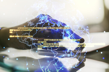 Multi exposure of abstract programming language hologram with world map and hand working with a digital tablet on background, artificial intelligence and neural networks concept