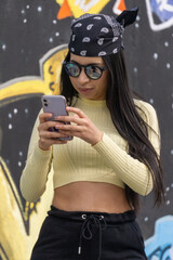 girl answering a message on the mobile phone