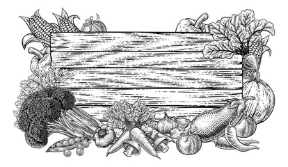 A fresh vegetables garden produce border background sign in a retro vintage engraved woodcut style