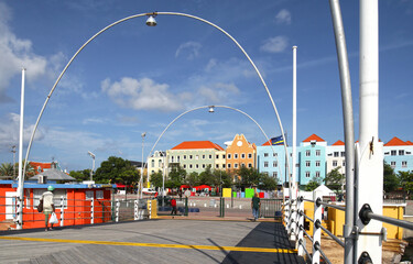 Willemstad, Curacao- Queen Emma Pontoon Bridge.  It is a swing bridge that opens to allow boats to enter St Anna Bay