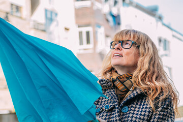 woman with umbrella on the city street