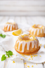 Mini lemon bundt cakes topped with lemon glaze