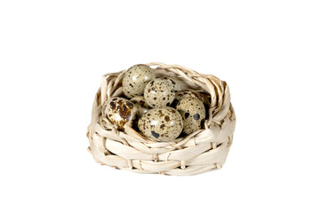 Boiled spotted quail eggs in a wicker basket, isolated on white background.  Healthy Food Products Concept.