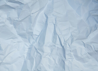 Wrinkled white paper texture for design elements.