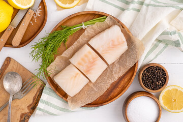 Healthy halibut with herbs. Healthy seafood and fish for diet. - obrazy, fototapety, plakaty