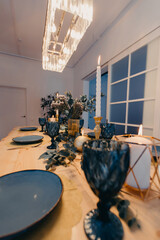 Table setting in blue and gold colors.