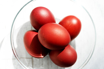 Naturally colored Easter eggs with onion husks. Non-toxic red coloring
