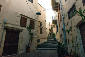 Narrow street in the old town of Chania, with colorful buildings, Crete, Greece
