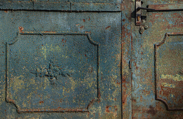 textured surface of a metal rusty door, yellow blue and rusty color, old painting of a vintage forged entrance gate, beautiful rust on metal, door handle, geometric shapes