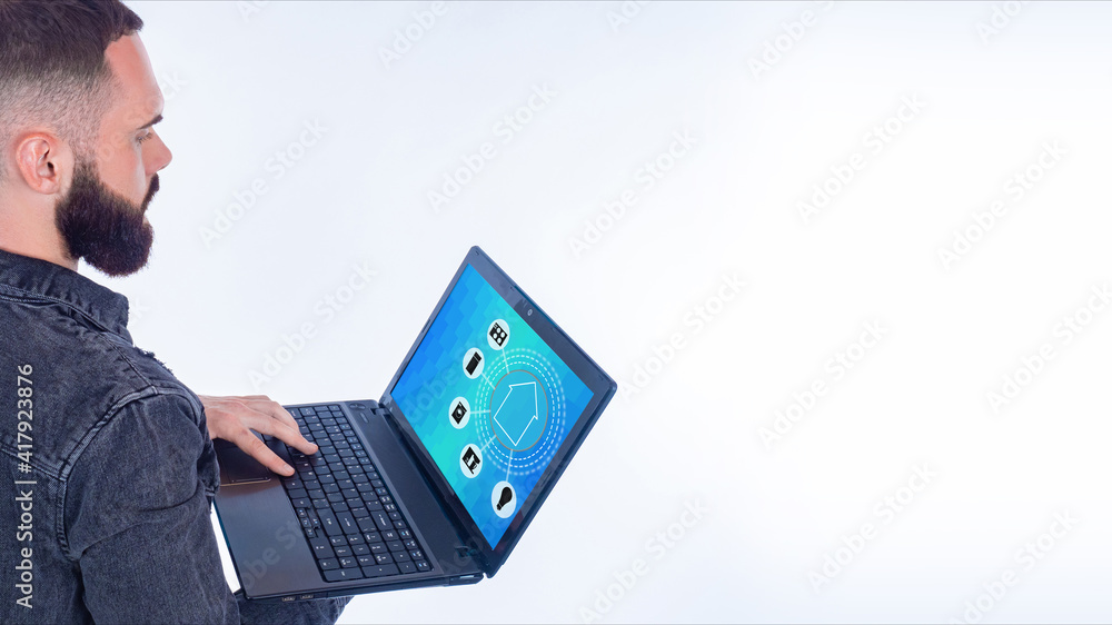 Poster a bearded man remotely controls the systems of his home. application of the smart home system. a man