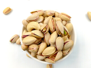 Roasted salted pistachio nuts in nutshell