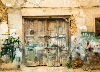 Tanzania, Zanzibar, a locked garage door in stone town.