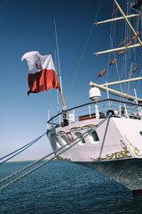 Rear part of old sailing ship moored in port