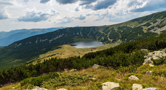 Zanoaga mountain lake in Retezat mountains in Romania