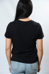 Young woman black t-shirt mockup, back view - hispanic t-shirt template