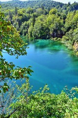 Breathtaking view in the Plitvice Lakes National Park. Turquoise transparent water in karst cascading lakes