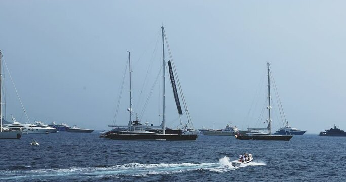 Yachts participants of Yacht show stand at port Oat-flakes along the coast, expecting viewing of clients, brokers and guests of an exhibition