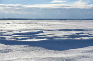 Naklejka na ściany i meble Snowy plain on a clear winter day