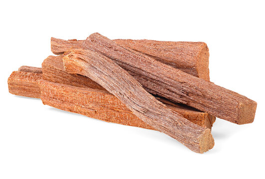 Pile of sandalwood sticks isolated on a white background. Chandan or sandalwood. Perfume.