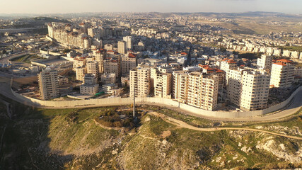 Palestinian Anata Refugees Camp with security wall,jerusalem - aerial view
Drone view from east Jerusalem, close to pisgat zeev neighbourhood, Judean desert

