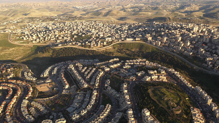Israel and Palestine divided by security wall, aerial view
drone view with anata refugees camp and...