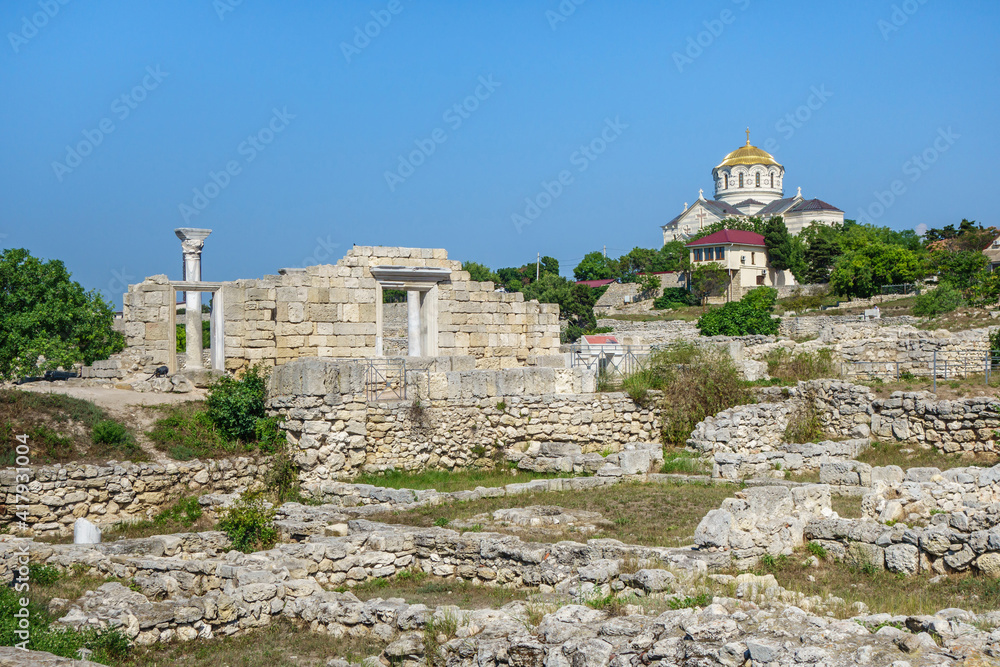 Wall mural Panorama of remains of ancient city Chersonesus, Sevastopol, Crimea. Left side is Christian basilica built in 6th century, known as 'Basilica 1935'. Right side is Vladimir Cathedral