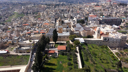 Arial view over Church of the Nativity And City Square Of Bethlehem
, Morning shot from Bethlehem,...