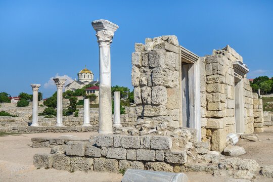Ancient church of VI century in antique city Chersonesus, Sevastopol, Crimea. Building called 'Basilica 1935'.  Vladimir's Cathedral is on background