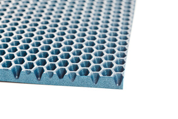 blue hexagonal punched EVA - ethylene vinyl acetate foam carpet linear perspective background with...