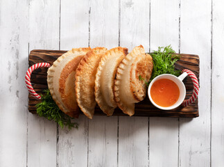 Homemade Fried chebureks. Tatar national cuisine. Top view.