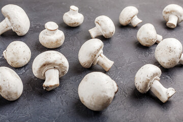 Mushrooms. Peeled fresh champignons on the table.