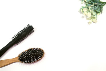 Professional combs on a white background. Three combs on a light background. Space for the text.