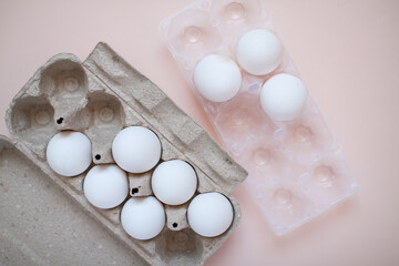 The white eggs are stored in recyclable and plastic cassettes. Waste sorting. Ecological problems. High quality photo