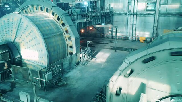 Functioning grinding mills at the mining factory