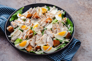Grilled chicken caesar salad with crunchy croutons
