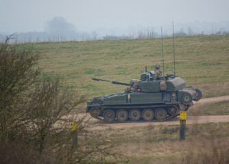 Fototapeta premium british army scorpion FV101 light infantry fighting vehicle tank on maneuvers Salisbury Plain, Wiltshire