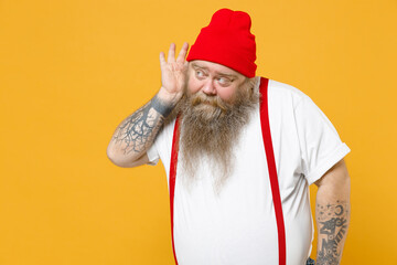 Fat pudge obese chubby overweight tattooed bearded curious man 30s has big belly in white t-shirt...