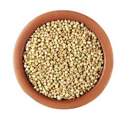 Buckwheat green seed pile in clay pot, bowl isolated on white background, top view