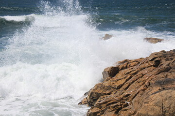 Sea view with rock and waves. Beautiful coast background. 