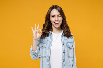 Young caucasian smiling happy brunette satisfied positive woman in stylish casual denim shirt white...
