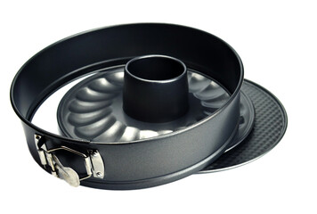 Disassembled round metal baking dish with non-stick coating isolated on white