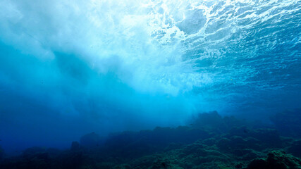 Fototapeta na wymiar Dreamy waves underwater