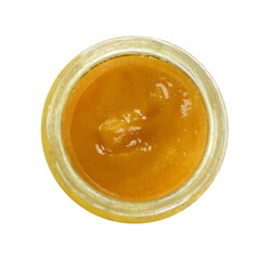 Crystallized honey flow from a dipper, close up.