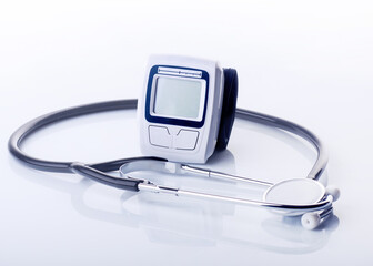 stethoscope, tonometer on white background