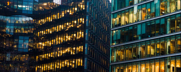 business office windows at night  Corporate building London City  England - obrazy, fototapety, plakaty